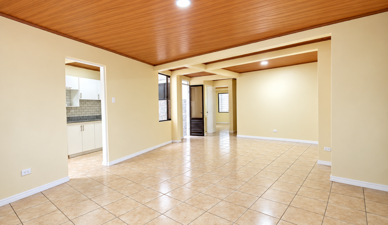 Salón diáfano moderno con cocina abierta